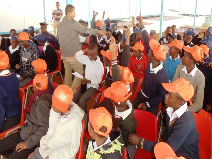 Facilitator of Boys 2 Men workshop interacting with pupils